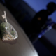 A bag of marijuana is on display as suspects are presented to the media after their arrest in Monterrey December 30, 2011. The two suspects were arrested after police found a small bag with marijuana valued at approximately 500 pesos ($36) in their car during a routine check, according to local media. (MEXICO - Tags: CRIME LAW DRUGS SOCIETY) - GM1E7CV15O601